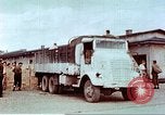 Image of Liberated American airmen and Red Cross aid at Stalag 7A prison camp Moosburg Germany, 1945, second 40 stock footage video 65675060145