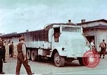 Image of Liberated American airmen and Red Cross aid at Stalag 7A prison camp Moosburg Germany, 1945, second 44 stock footage video 65675060145