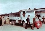 Image of Liberated American airmen and Red Cross aid at Stalag 7A prison camp Moosburg Germany, 1945, second 47 stock footage video 65675060145