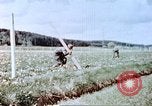 Image of German prisoners of war building a barbed wire enclosure Germany, 1945, second 16 stock footage video 65675060149