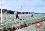 Image of German prisoners of war building a barbed wire enclosure Germany, 1945, second 18 stock footage video 65675060149