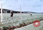 Image of German prisoners of war building a barbed wire enclosure Germany, 1945, second 20 stock footage video 65675060149