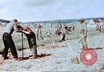 Image of German prisoners of war building a barbed wire enclosure Germany, 1945, second 25 stock footage video 65675060149