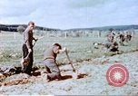 Image of German prisoners of war building a barbed wire enclosure Germany, 1945, second 38 stock footage video 65675060149