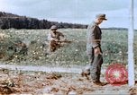 Image of German prisoners of war building a barbed wire enclosure Germany, 1945, second 49 stock footage video 65675060149