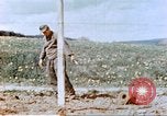 Image of German prisoners of war building a barbed wire enclosure Germany, 1945, second 55 stock footage video 65675060149
