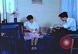Image of Japanese-American family in Internment camp United States USA, 1942, second 26 stock footage video 65675060168