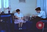 Image of Japanese-American family in Internment camp United States USA, 1942, second 27 stock footage video 65675060168