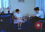 Image of Japanese-American family in Internment camp United States USA, 1942, second 30 stock footage video 65675060168