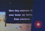 Image of Japanese-American family in Internment camp United States USA, 1942, second 48 stock footage video 65675060168