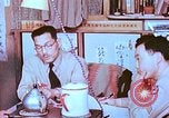 Image of Japanese-American family in Internment camp United States USA, 1942, second 55 stock footage video 65675060168