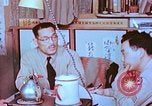Image of Japanese-American family in Internment camp United States USA, 1942, second 56 stock footage video 65675060168