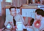 Image of Japanese-American family in Internment camp United States USA, 1942, second 57 stock footage video 65675060168