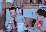 Image of Japanese-American family in Internment camp United States USA, 1942, second 60 stock footage video 65675060168