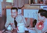 Image of Japanese-American family in Internment camp United States USA, 1942, second 61 stock footage video 65675060168