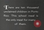 Immagine di I bambini hanno pasti Puerto Rico, 1931, secondo 5 filmato di repertorio 65675060226