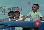 Standbild vietnamesische Kinder Saigon Vietnam, 1967, aus Sekunde 47 historischem Filmmaterial Videoclip 65675060279