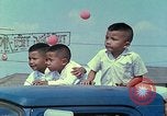 Standbild vietnamesische Kinder Saigon Vietnam, 1967, aus Sekunde 52 historischem Filmmaterial Videoclip 65675060279