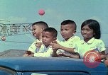 Standbild vietnamesische Kinder Saigon Vietnam, 1967, aus Sekunde 58 historischem Filmmaterial Videoclip 65675060279