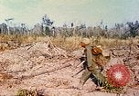 Image of 1st Infantry Division soldiers Vietnam, 1968, second 48 stock footage video 65675060284