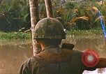 Image of soldiers of Mobile Riverine Force Dong Tam Vietnam, 1968, second 42 stock footage video 65675060289