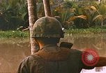 Image of soldiers of Mobile Riverine Force Dong Tam Vietnam, 1968, second 43 stock footage video 65675060289
