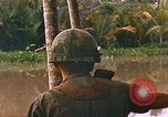 Image of soldiers of Mobile Riverine Force Dong Tam Vietnam, 1968, second 44 stock footage video 65675060289
