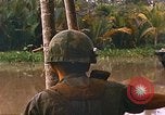 Image of soldiers of Mobile Riverine Force Dong Tam Vietnam, 1968, second 45 stock footage video 65675060289