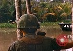 Image of soldiers of Mobile Riverine Force Dong Tam Vietnam, 1968, second 47 stock footage video 65675060289