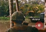 Image of soldiers of Mobile Riverine Force Dong Tam Vietnam, 1968, second 50 stock footage video 65675060289