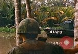 Image of soldiers of Mobile Riverine Force Dong Tam Vietnam, 1968, second 51 stock footage video 65675060289