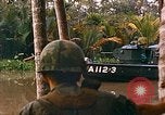 Image of soldiers of Mobile Riverine Force Dong Tam Vietnam, 1968, second 53 stock footage video 65675060289