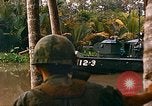 Image of soldiers of Mobile Riverine Force Dong Tam Vietnam, 1968, second 54 stock footage video 65675060289
