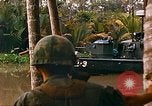 Image of soldiers of Mobile Riverine Force Dong Tam Vietnam, 1968, second 55 stock footage video 65675060289