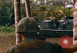 Image of soldiers of Mobile Riverine Force Dong Tam Vietnam, 1968, second 56 stock footage video 65675060289