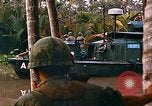 Image of soldiers of Mobile Riverine Force Dong Tam Vietnam, 1968, second 59 stock footage video 65675060289