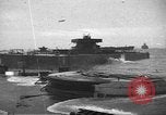 Image of concrete barges Normandy France, 1944, second 1 stock footage video 65675060370