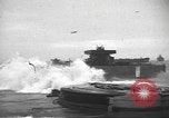 Image of concrete barges Normandy France, 1944, second 5 stock footage video 65675060370