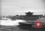 Image of concrete barges Normandy France, 1944, second 6 stock footage video 65675060370