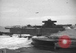 Image of concrete barges Normandy France, 1944, second 8 stock footage video 65675060370