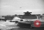 Image of concrete barges Normandy France, 1944, second 9 stock footage video 65675060370
