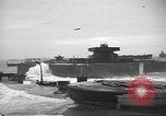 Image of concrete barges Normandy France, 1944, second 11 stock footage video 65675060370