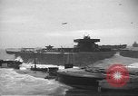 Image of concrete barges Normandy France, 1944, second 12 stock footage video 65675060370