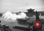 Image of concrete barges Normandy France, 1944, second 15 stock footage video 65675060370