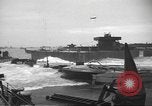 Image of concrete barges Normandy France, 1944, second 20 stock footage video 65675060370