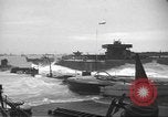 Image of concrete barges Normandy France, 1944, second 21 stock footage video 65675060370