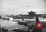 Image of concrete barges Normandy France, 1944, second 22 stock footage video 65675060370