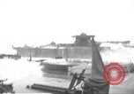 Image of concrete barges Normandy France, 1944, second 25 stock footage video 65675060370