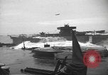 Image of concrete barges Normandy France, 1944, second 28 stock footage video 65675060370