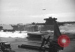 Image of concrete barges Normandy France, 1944, second 31 stock footage video 65675060370